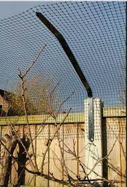 how to keep my cat from jumping our fence